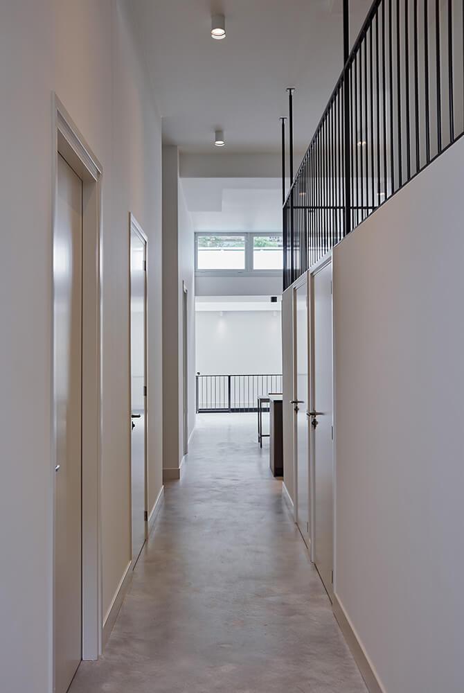 Transformatie fabriekshal tot 2 luxe woningen · Sint-Willibrordusstraat Amsterdam - transformatie door CJ de Boer