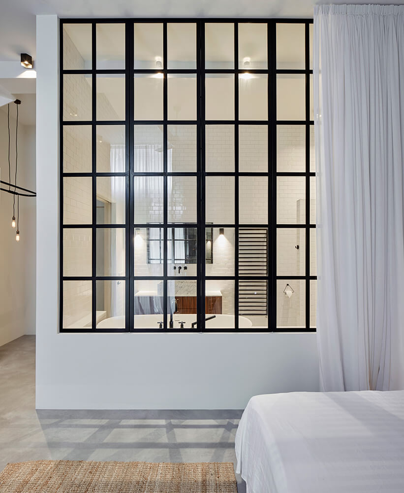 Transformatie fabriekshal tot 2 luxe woningen · Sint-Willibrordusstraat Amsterdam - transformatie door CJ de Boer