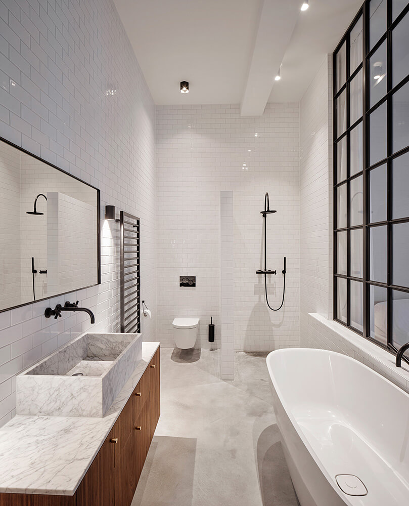 Transformatie fabriekshal tot 2 luxe woningen · Sint-Willibrordusstraat Amsterdam - transformatie door CJ de Boer