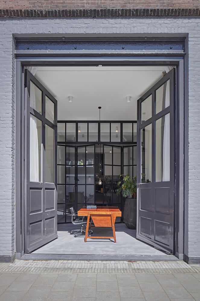 Transformatie fabriekshal tot 2 luxe woningen · Sint-Willibrordusstraat Amsterdam - transformatie door CJ de Boer